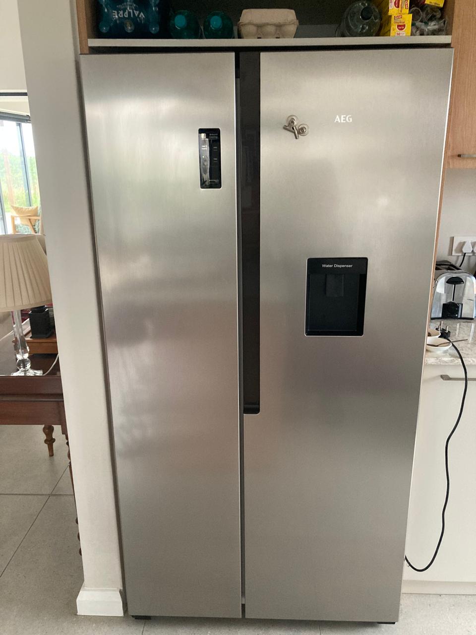 AEG side-by-side fridge-freezer with water dispenser in a Midrand kitchen