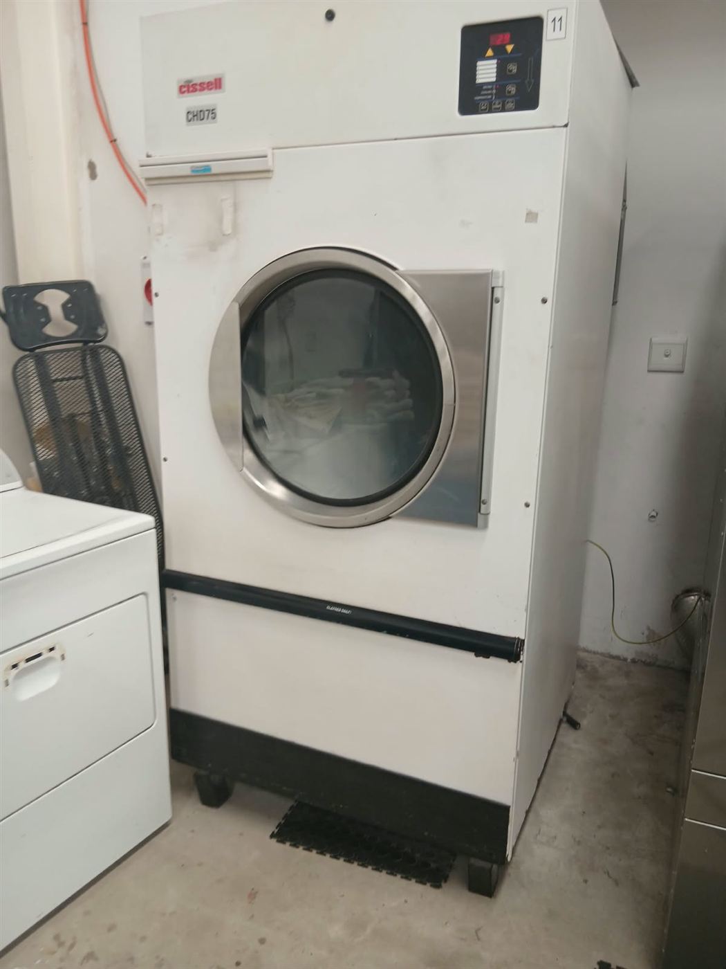 Cissell CHD75 commercial tumble dryer serviced at a laundromat in Fourways