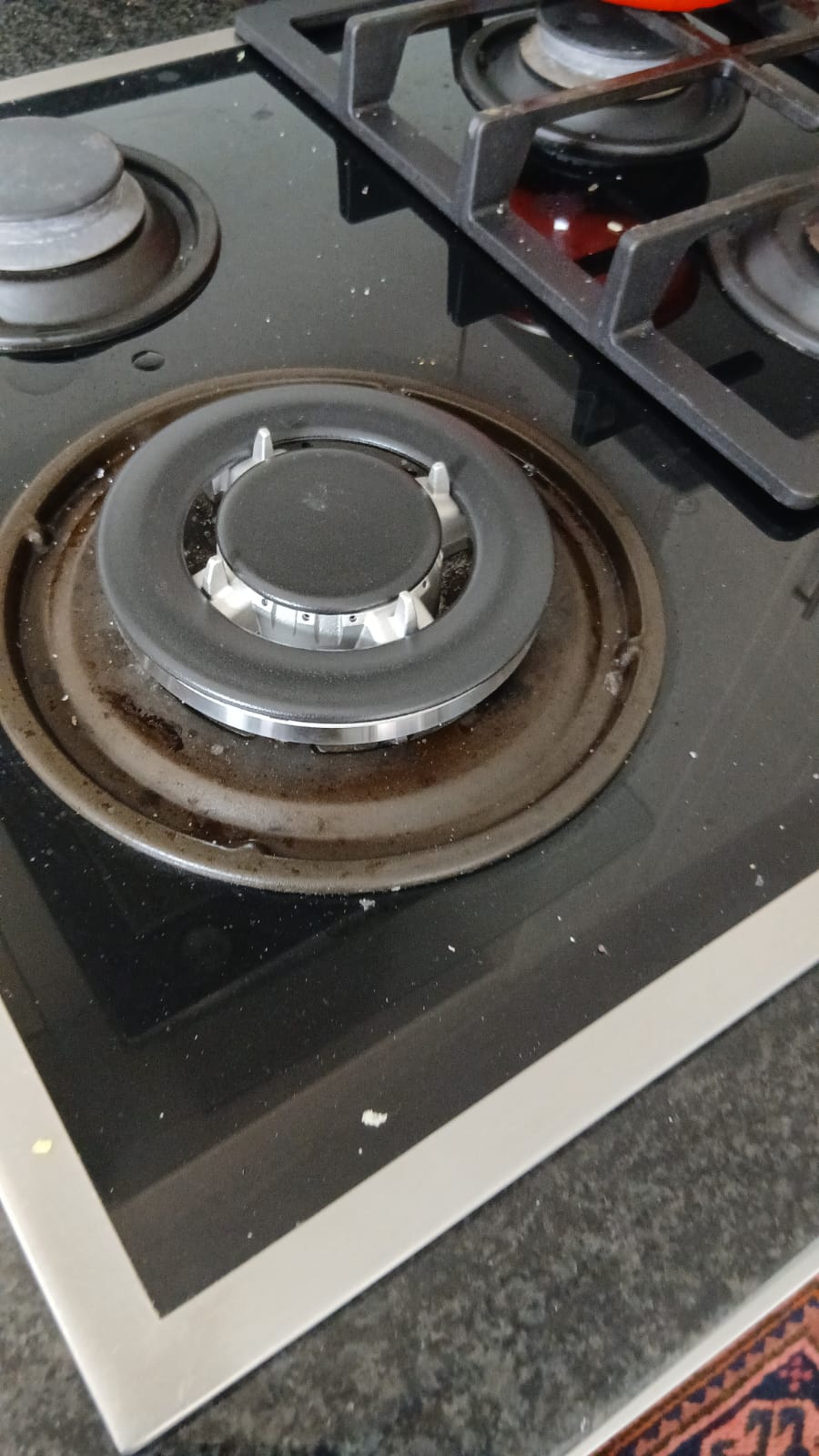 Swiss glass-top gas hob in Johannesburg South with a new replacement burner fitted after the old one warped