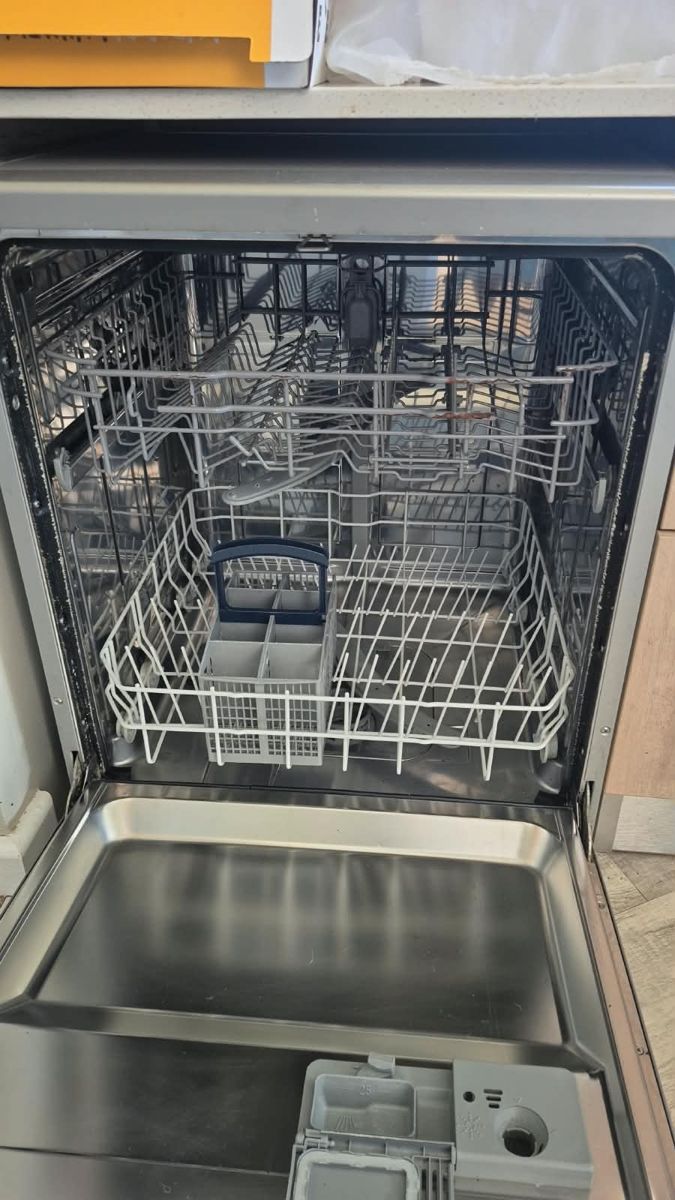 Inside a Hisense dishwasher after repair in Kempton Park