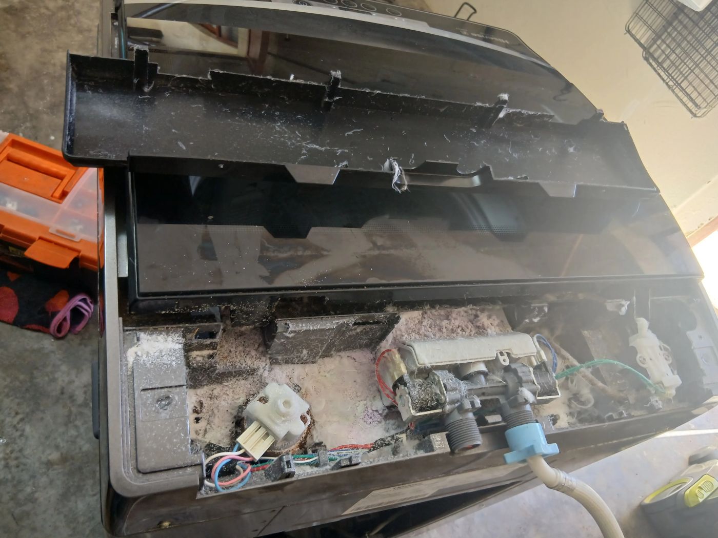 Detergent build-up and corroded water level sensor inside a Hisense washer in Bryanston