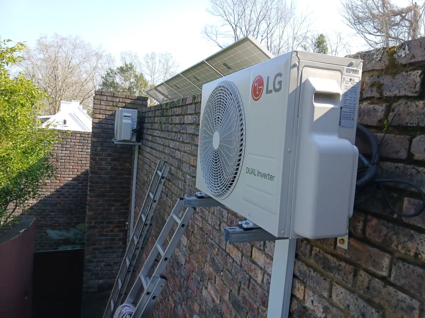 LG Dual Inverter split aircon outdoor unit installed on a bracket, Gauteng