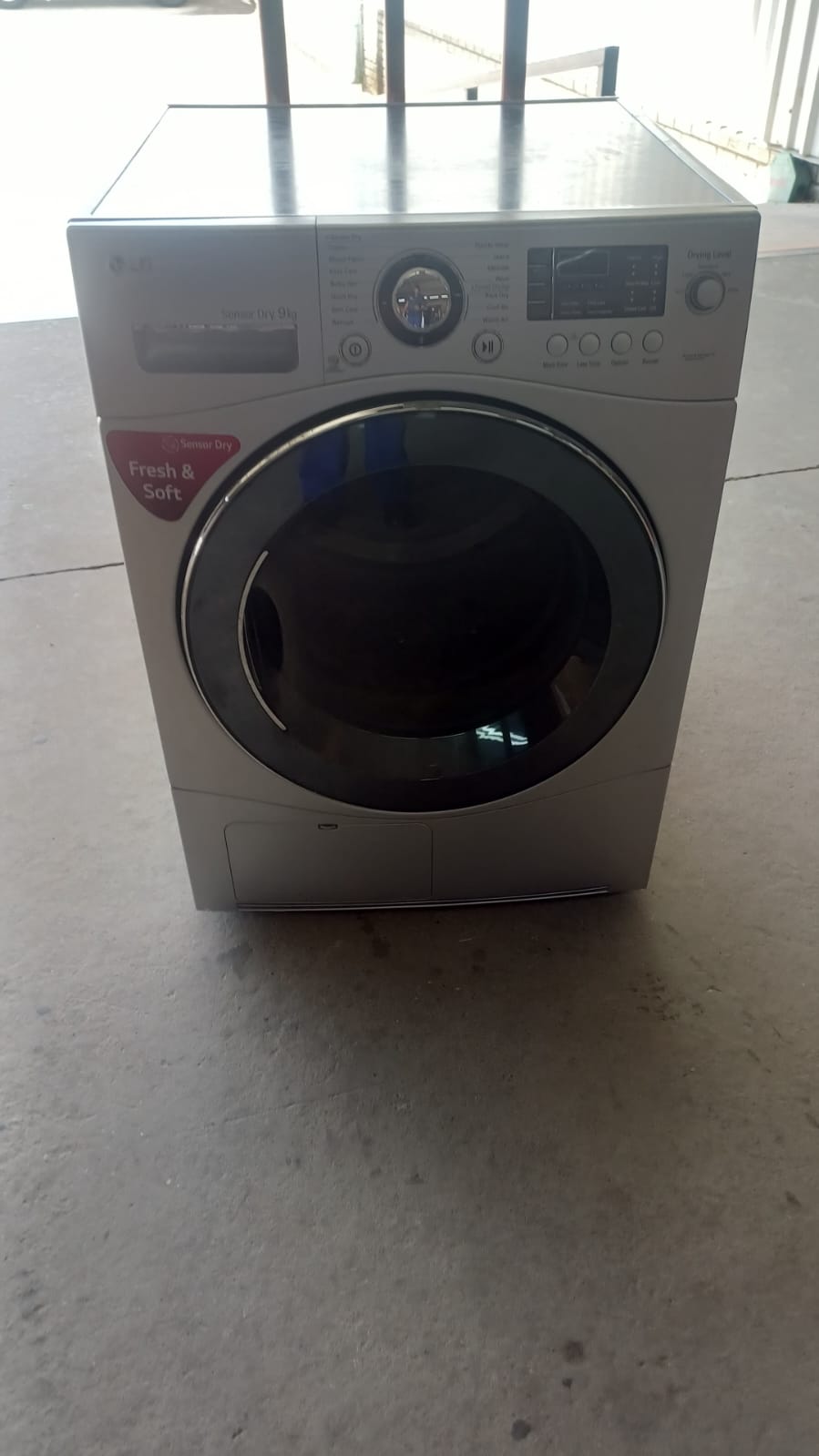 LG Sensor Dry 9kg condenser tumble dryer in Kempton Park after its drum roller bearings were replaced